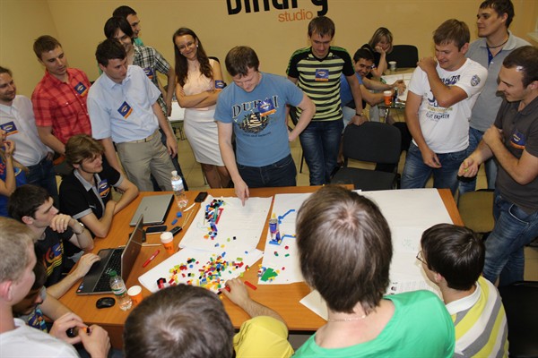 The participants of Cherdak Club build Paris quarter using Lego bricks.